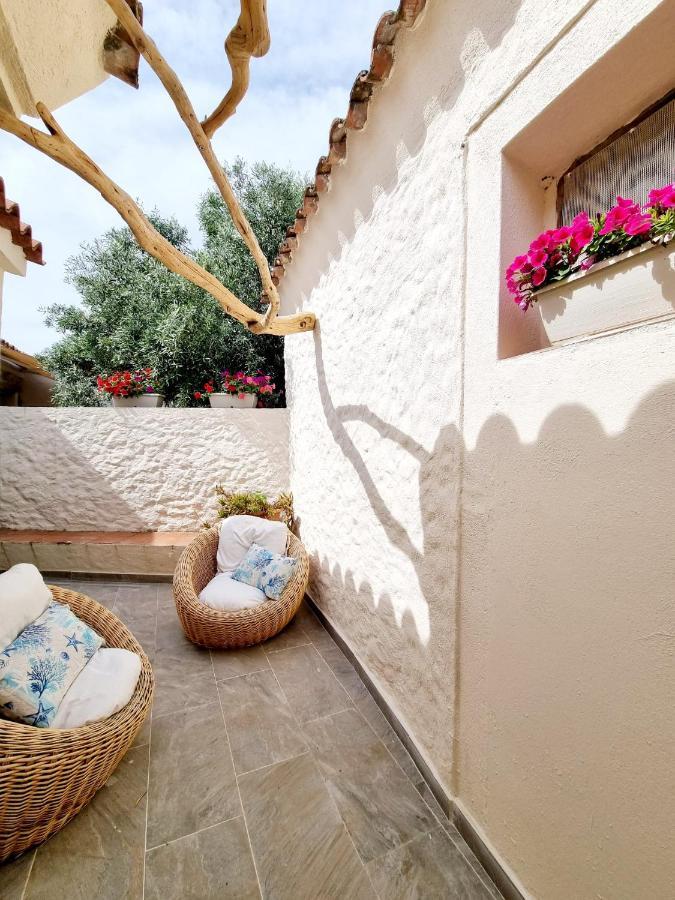 Stazzo San Teodoro Il Ginepro Piscina Condivisa Apartment Bagian luar foto