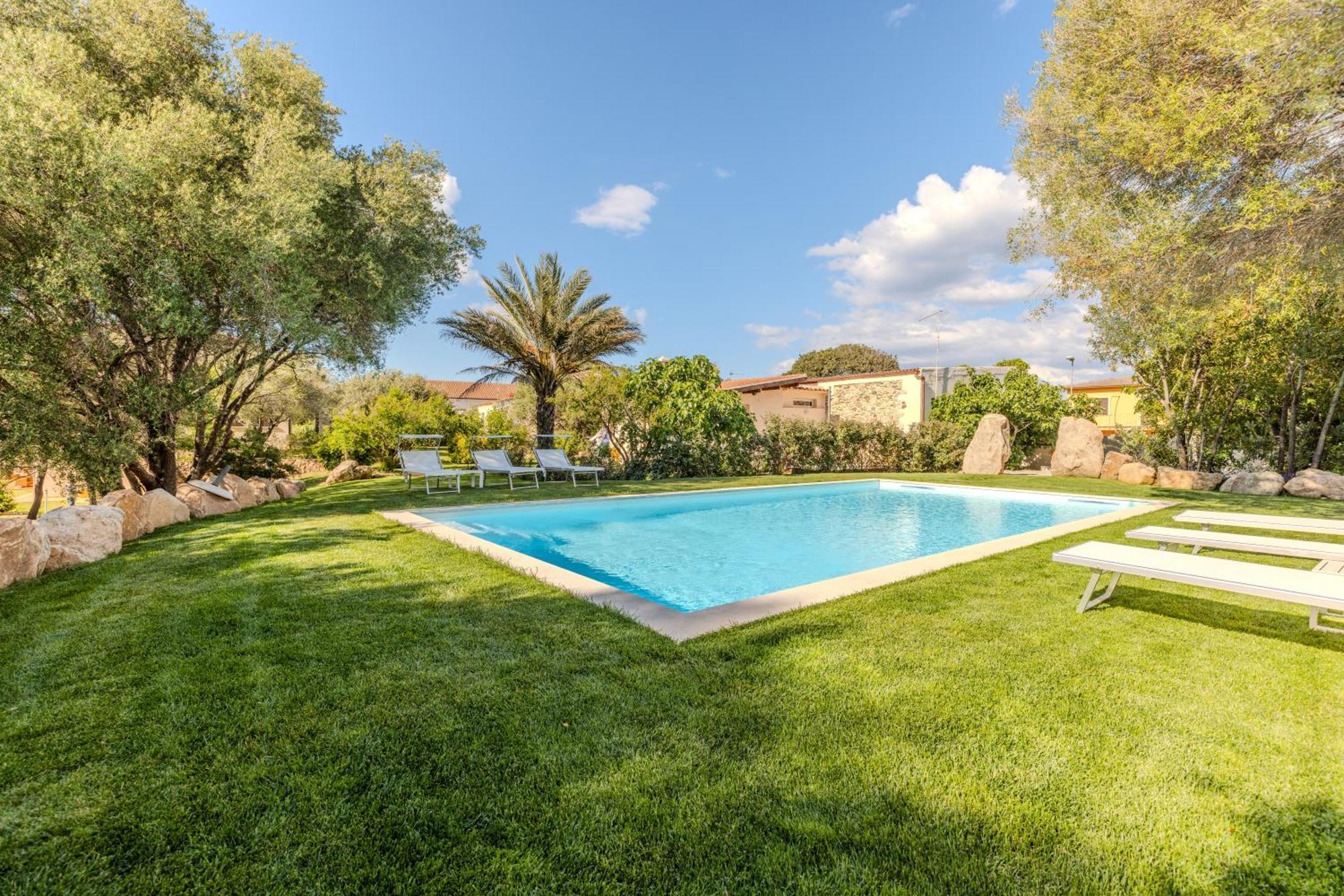 Stazzo San Teodoro Il Ginepro Piscina Condivisa Apartment Bagian luar foto