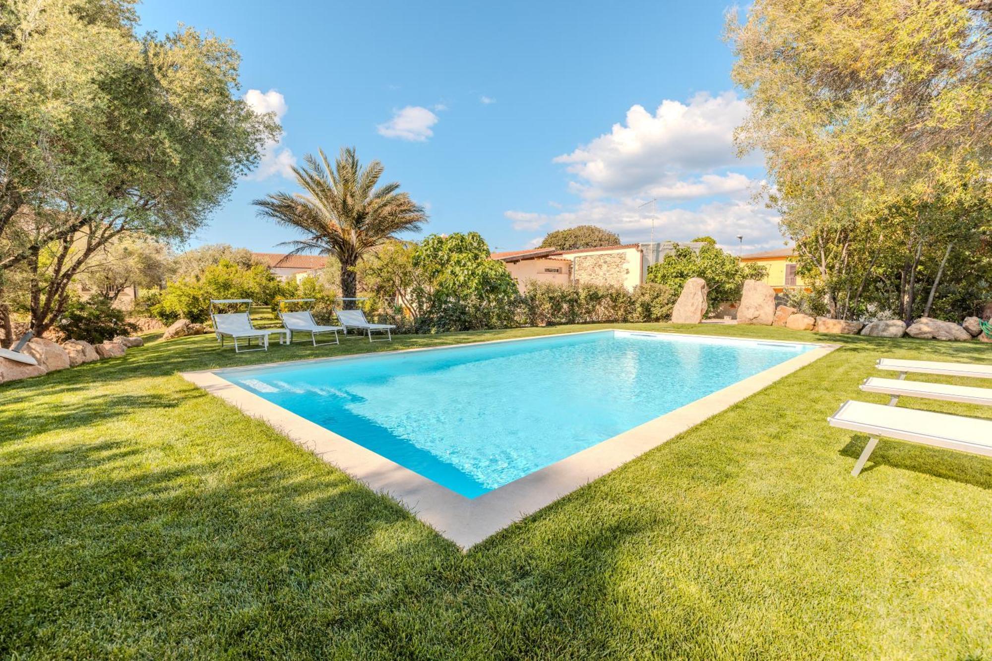 Stazzo San Teodoro Il Ginepro Piscina Condivisa Apartment Bagian luar foto