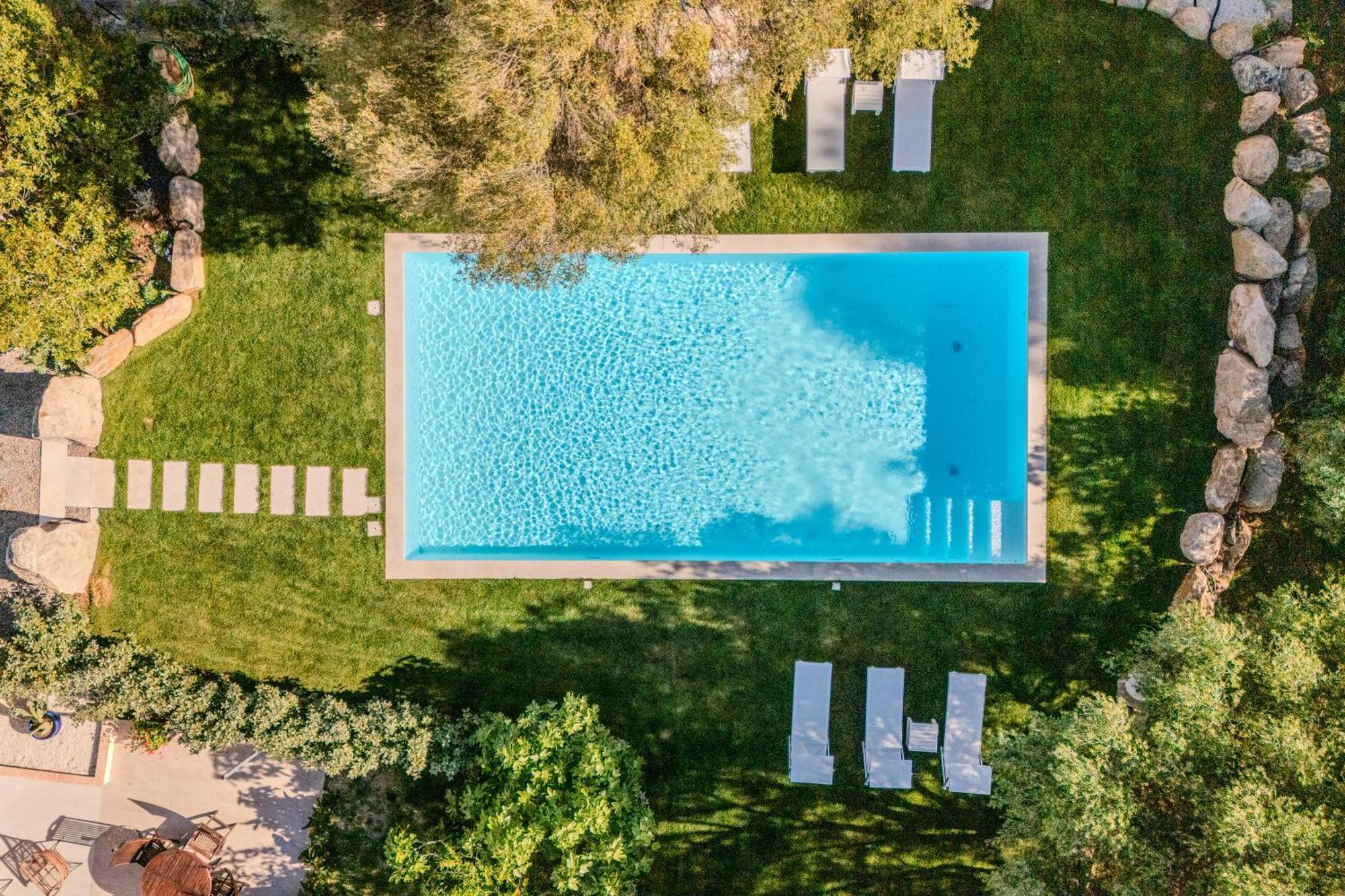 Stazzo San Teodoro Il Ginepro Piscina Condivisa Apartment Bagian luar foto